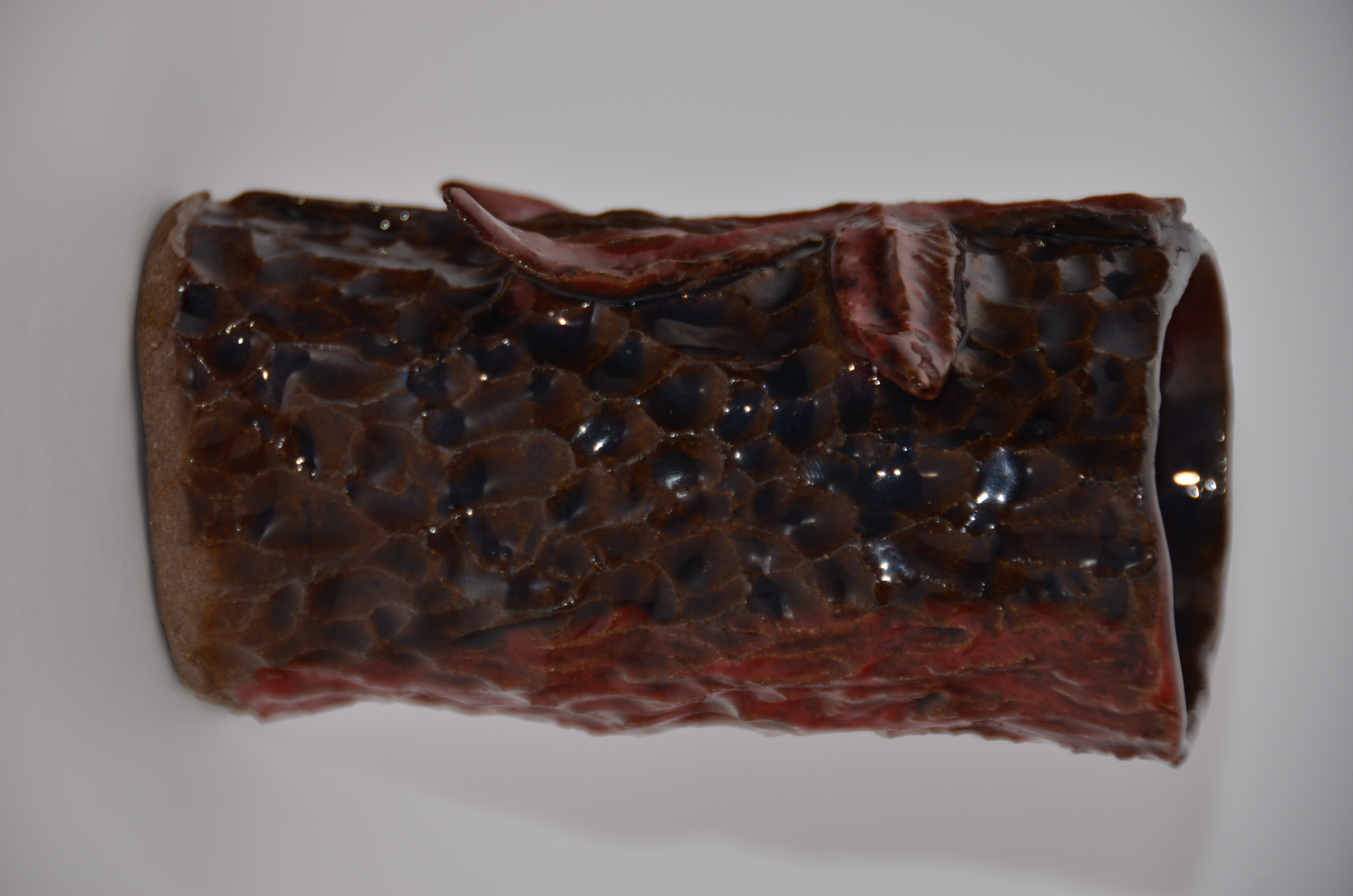 Stoneware vase with drip glaze